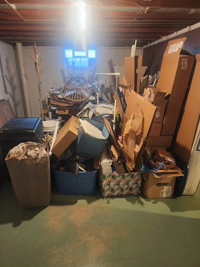 Roll-off dumpster container at job site for 20 Yard Dumpster Rental in Centreville